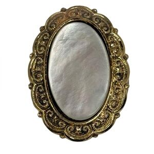 Vintage West Germany oval mother of pearl brooch clip